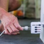 World travel adapter with ground plugs 7 A